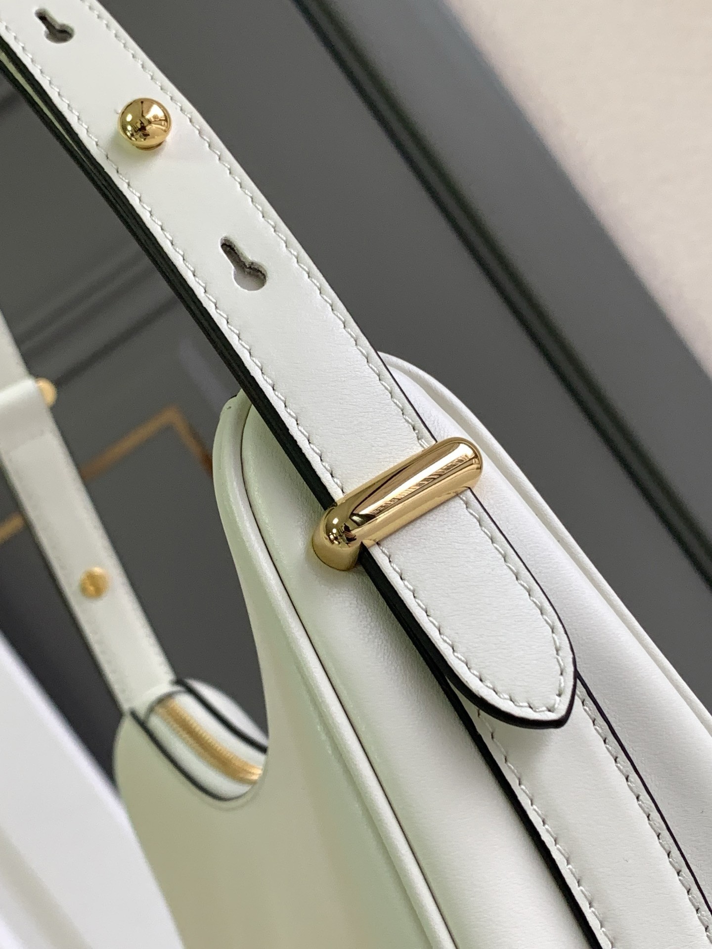 Pra*a arque shoulder bag in white leather