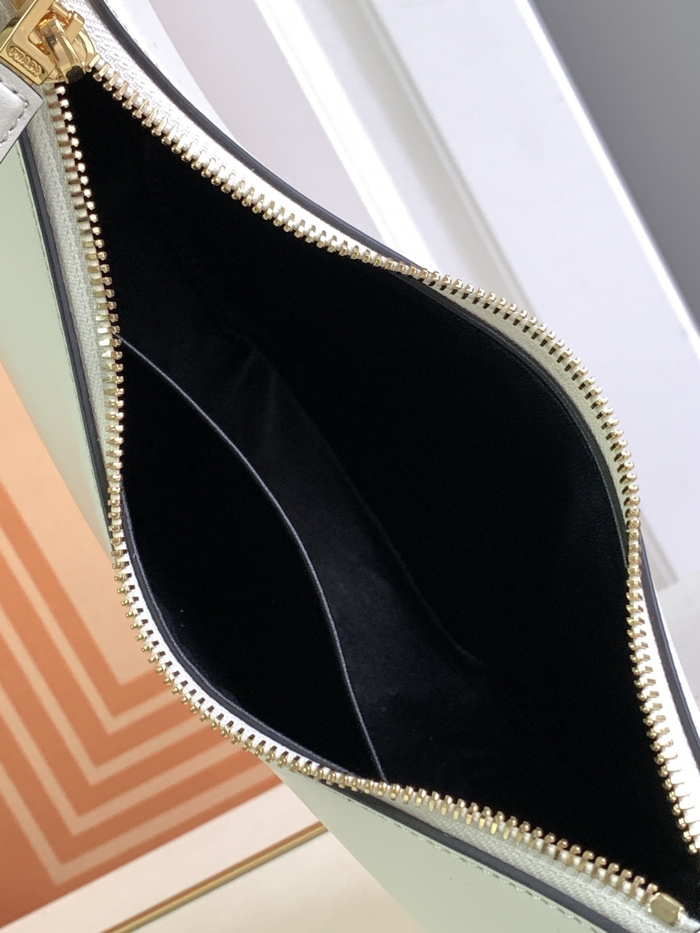 Pra*a arque shoulder bag in white leather