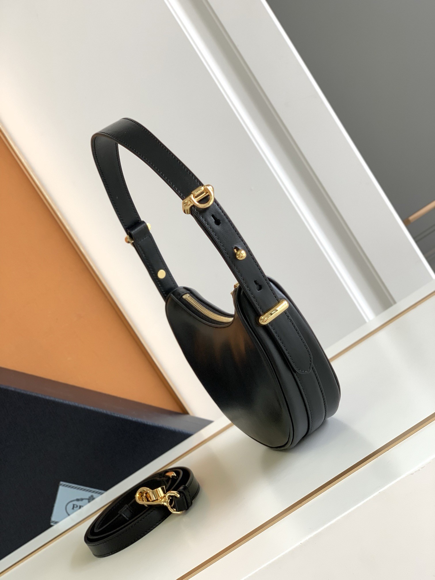 Pra*a arque mini shoulder bag in black leather