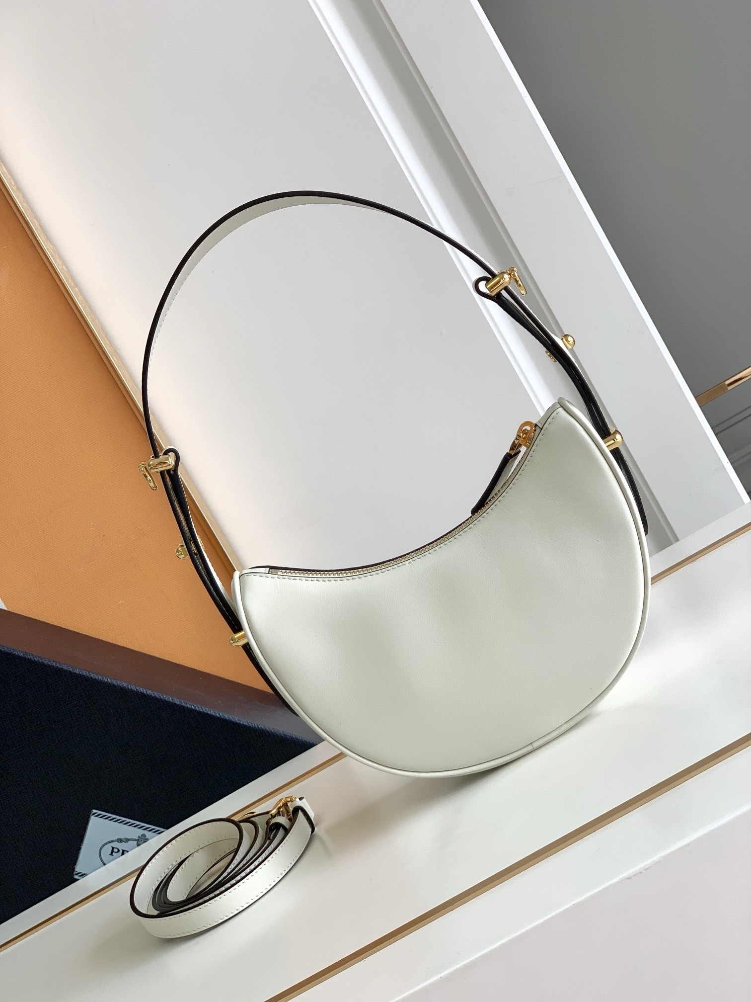 Pra*a arque mini shoulder bag in white leather