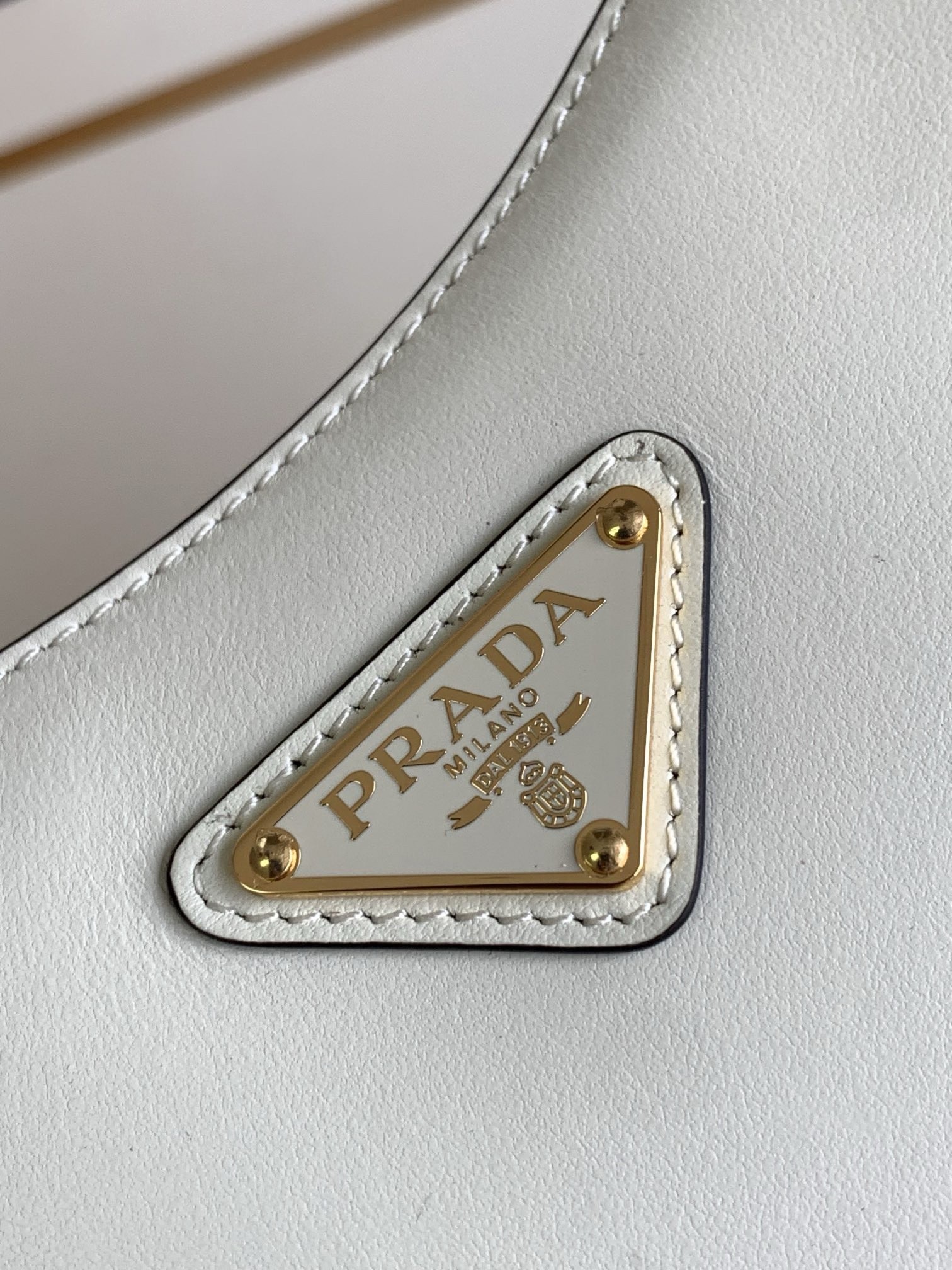 Pra*a arque mini shoulder bag in white leather