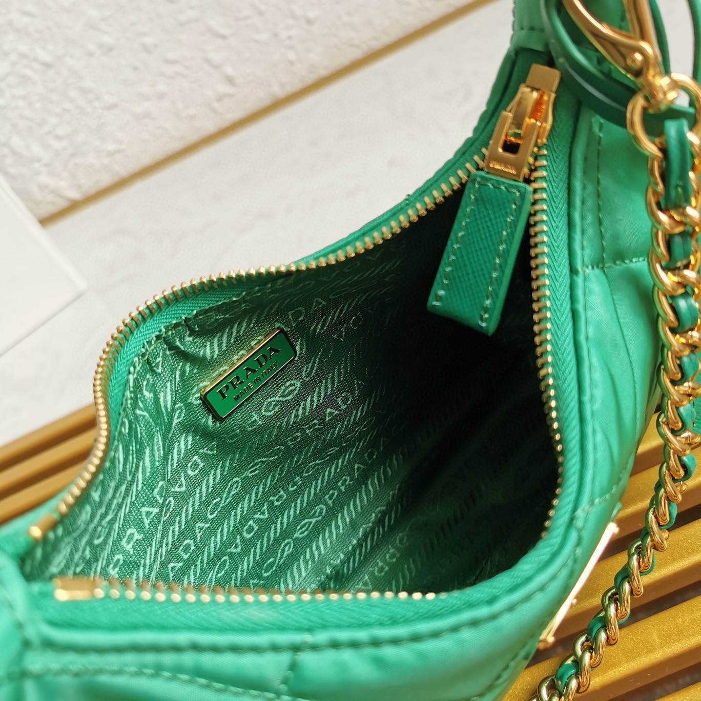 Pra*a re-edition 1995 chaine mini bag in green re-nylon