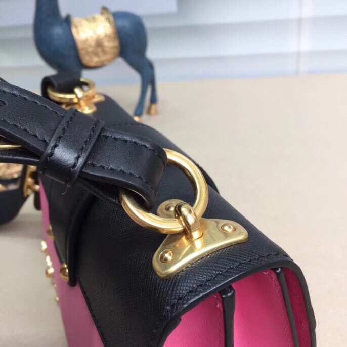 Pra*a cahier shoulder bag in pink/black leather