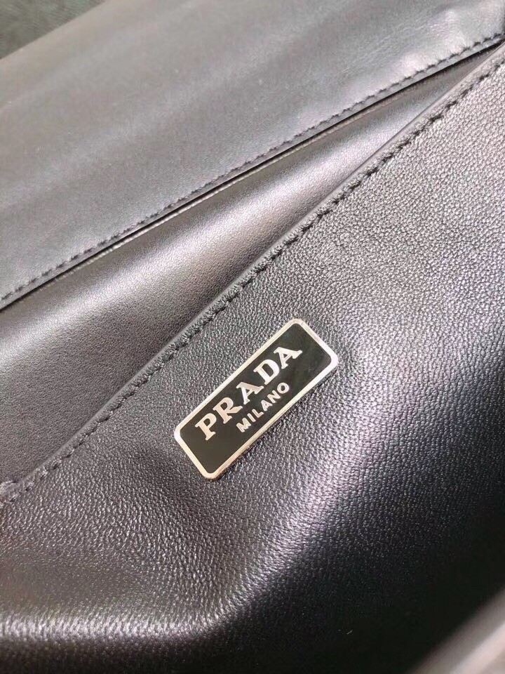 Pra*a cahier studded leather shoulder bag