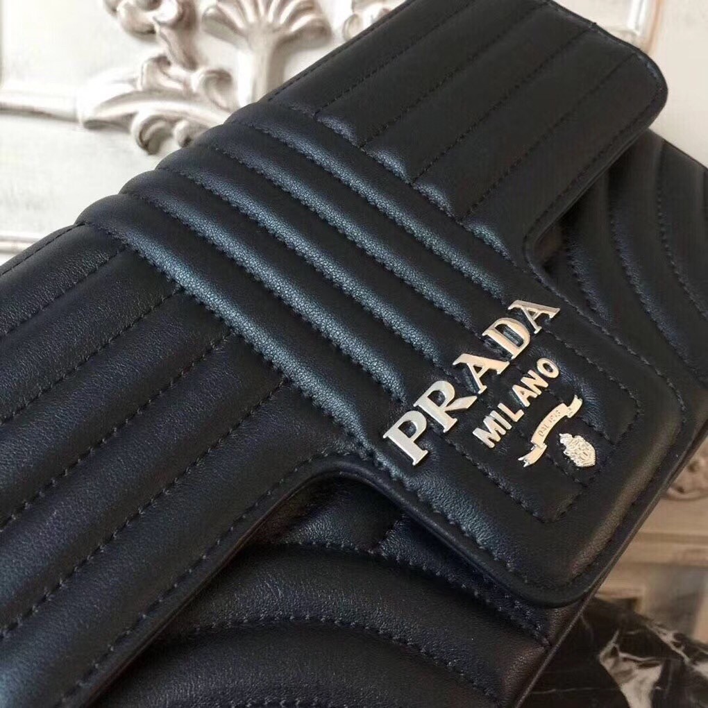 Pra*a diagramme flap bag in black calfskin
