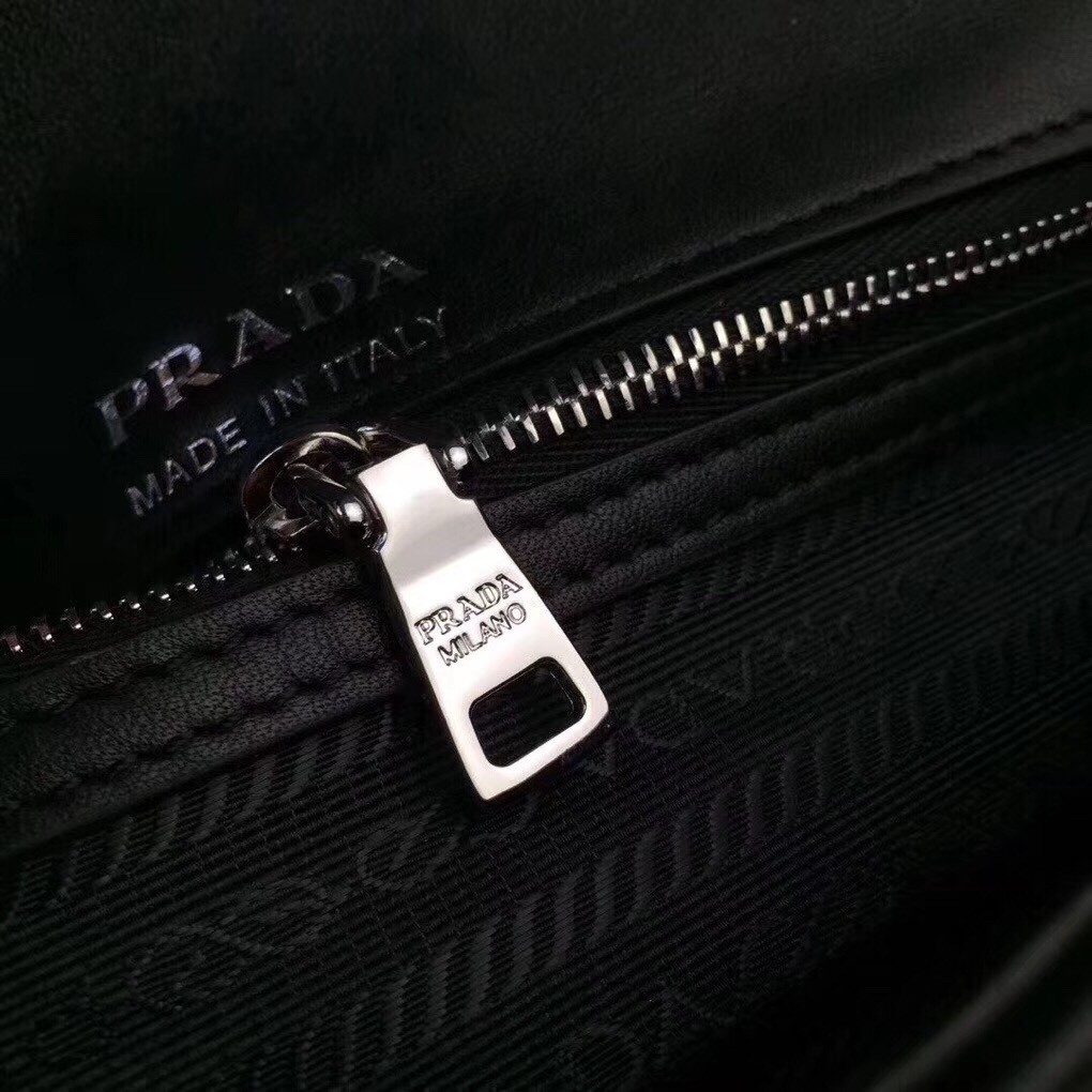 Pra*a diagramme flap bag in black calfskin