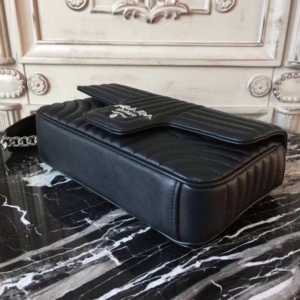 Pra*a diagramme flap bag in black calfskin