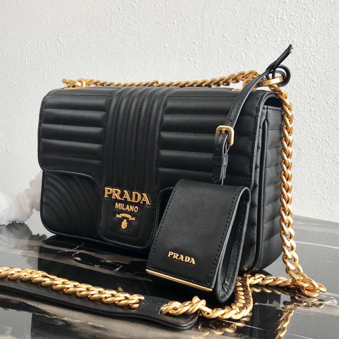 Pra*a medium diagramme flap bag in black calfskin