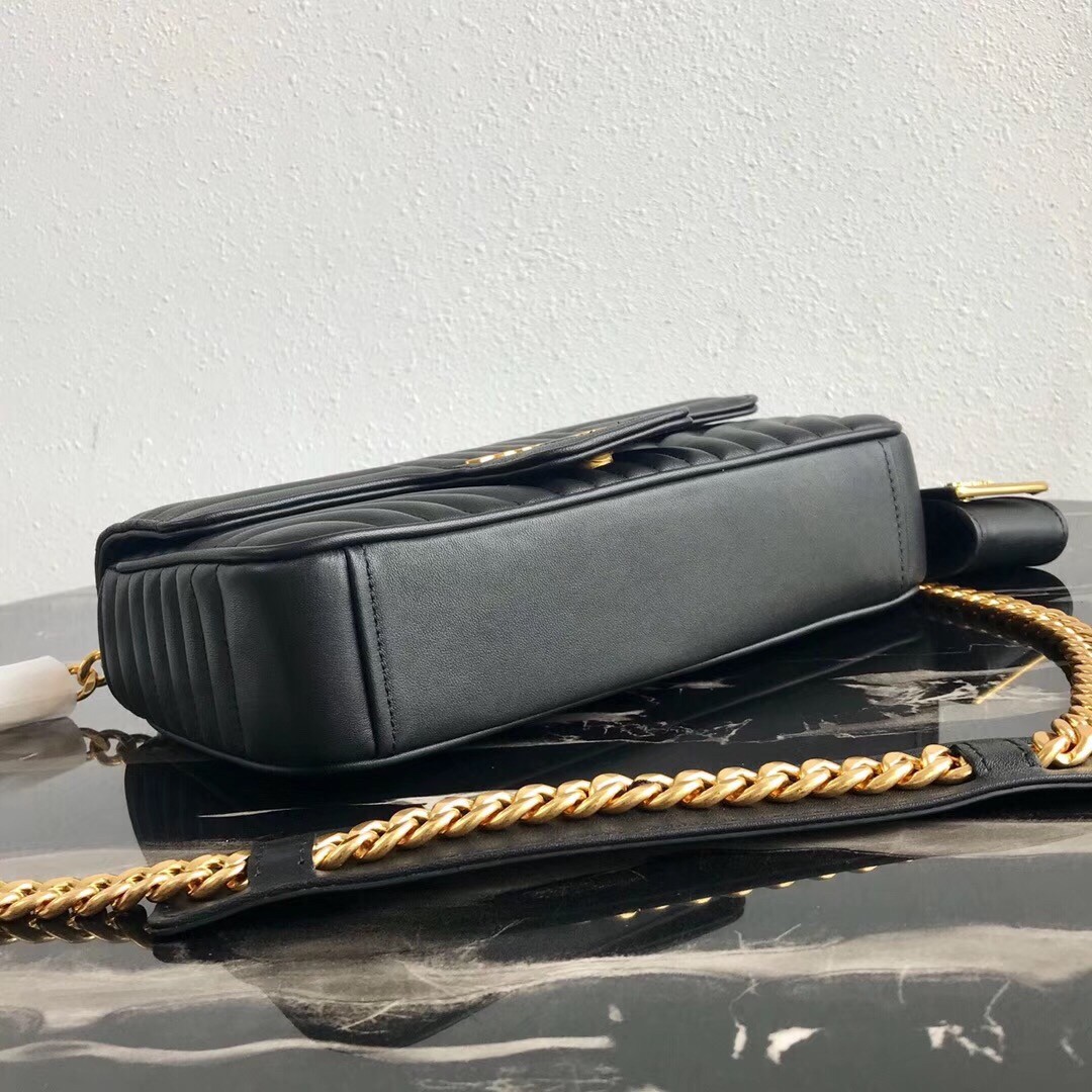 Pra*a medium diagramme flap bag in black calfskin