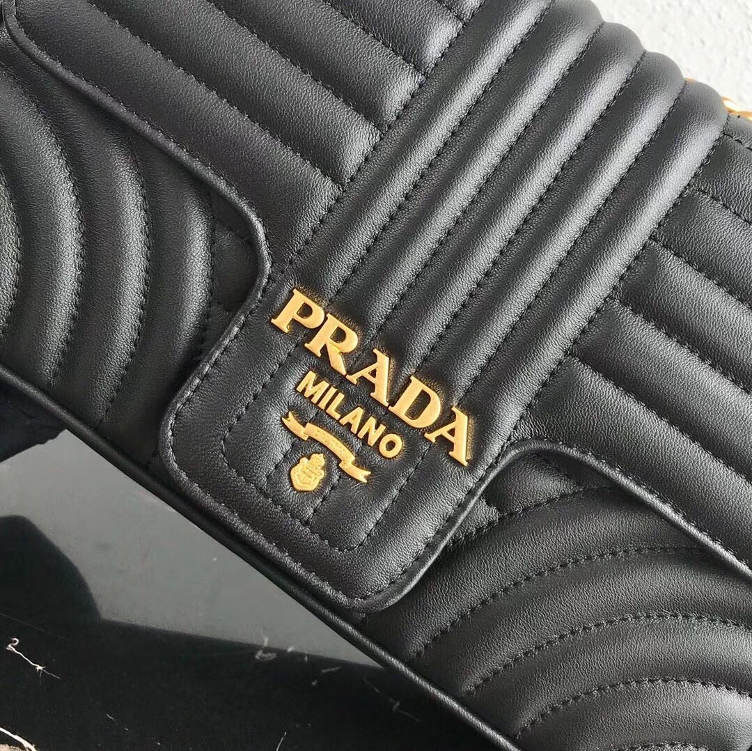 Pra*a medium diagramme flap bag in black calfskin