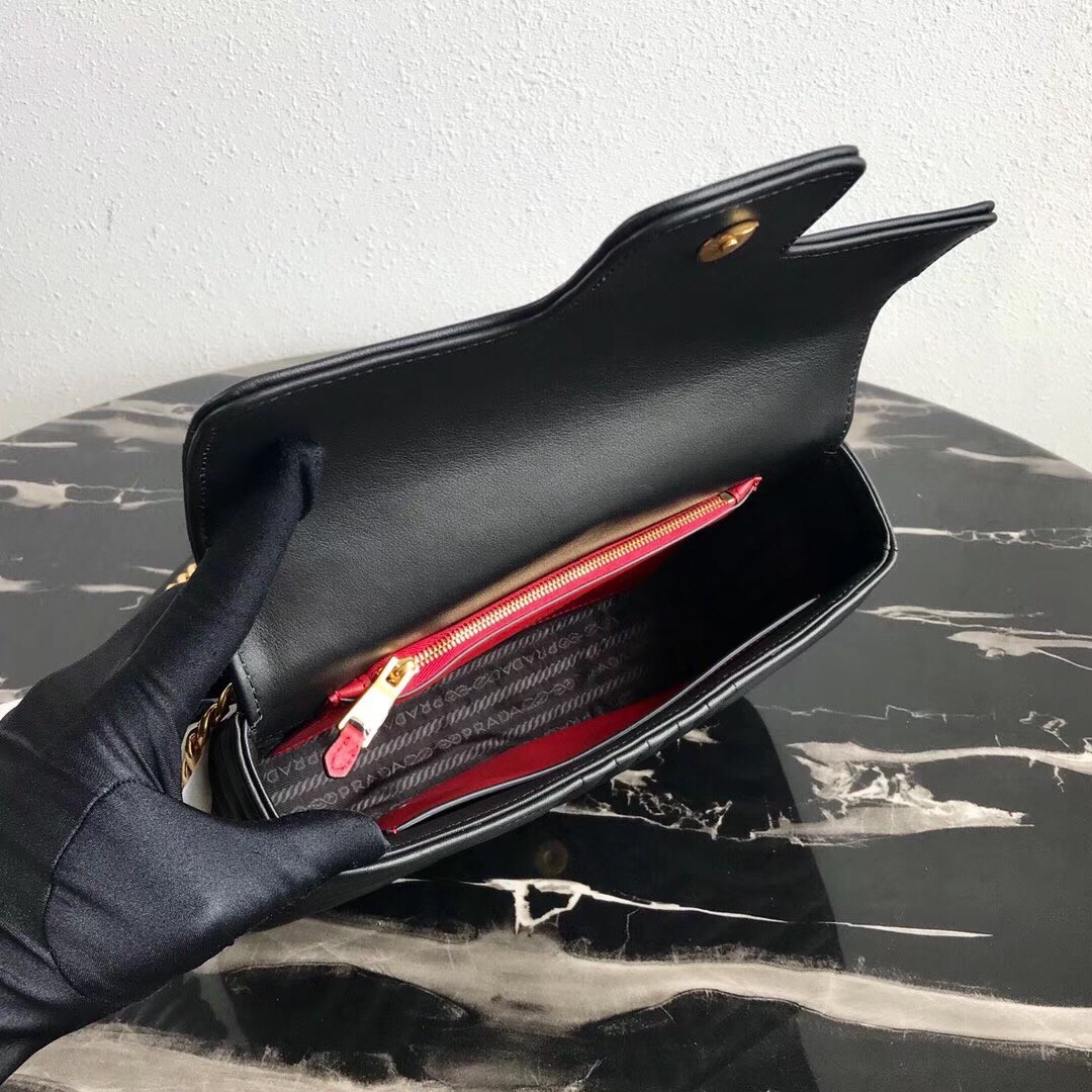 Pra*a medium diagramme flap bag in black calfskin