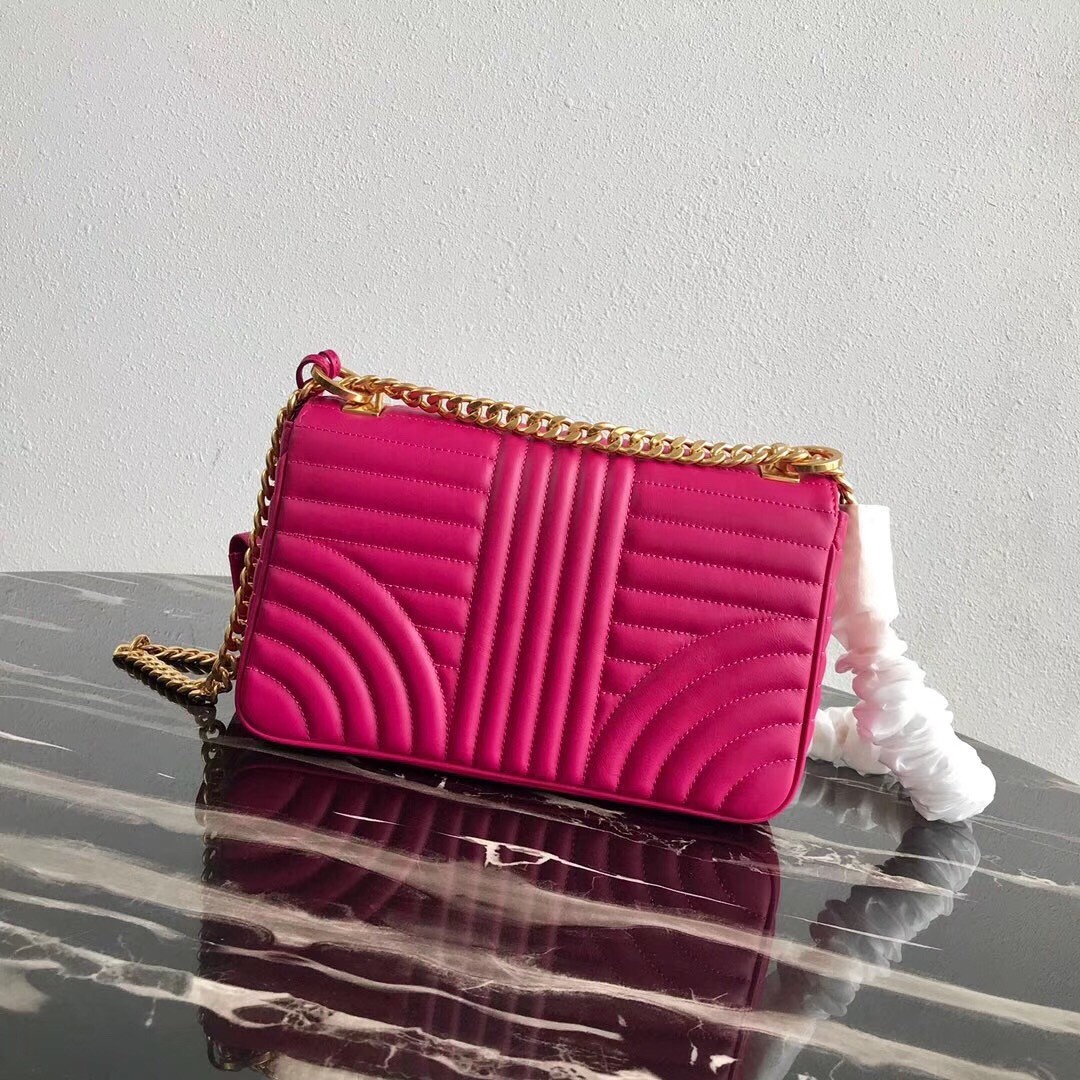 Pra*a medium diagramme flap bag in rose red calfskin