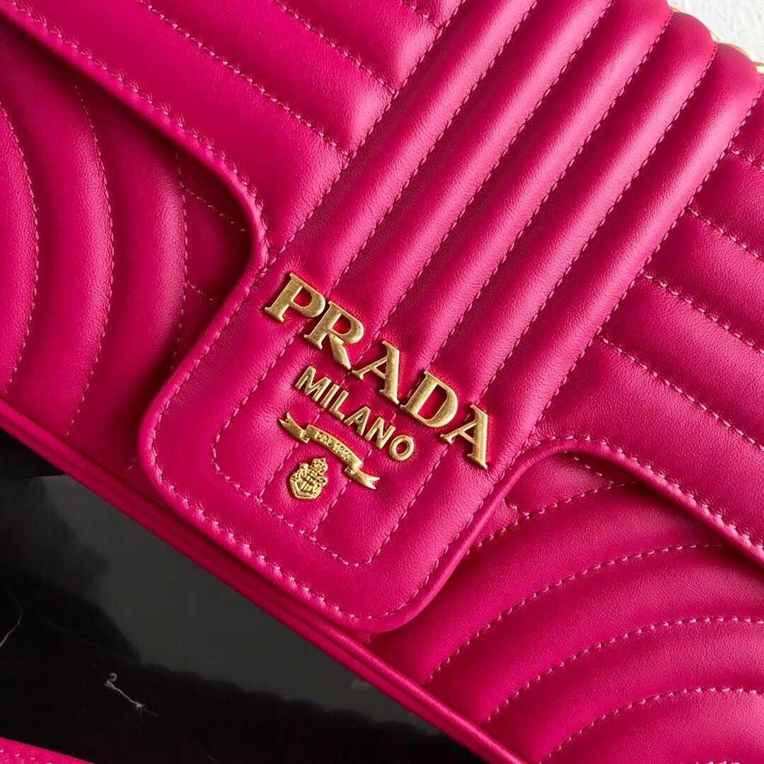 Pra*a medium diagramme flap bag in rose red calfskin