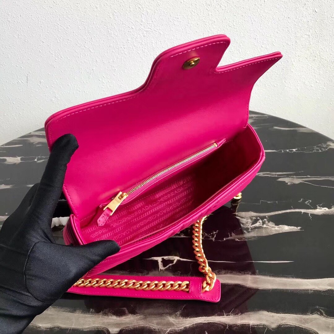 Pra*a medium diagramme flap bag in rose red calfskin
