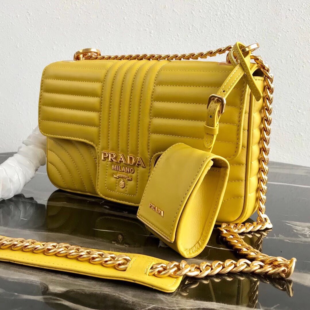 Pra*a medium diagramme flap bag in yellow calfskin