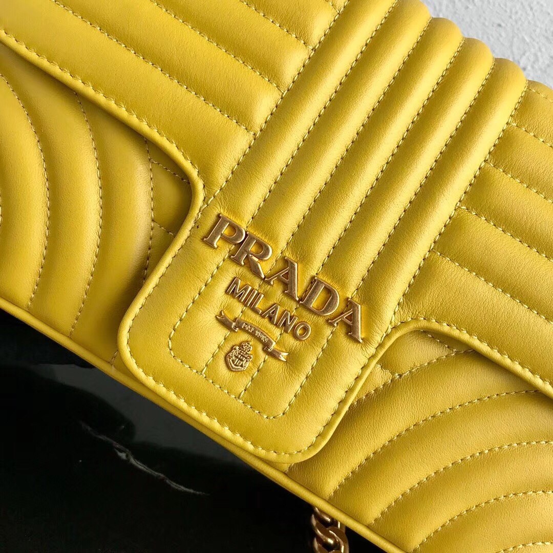 Pra*a medium diagramme flap bag in yellow calfskin