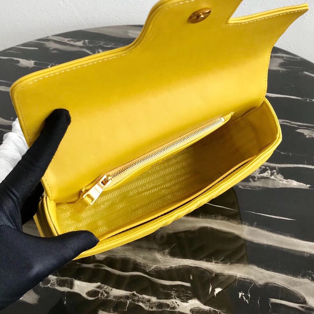 Pra*a medium diagramme flap bag in yellow calfskin