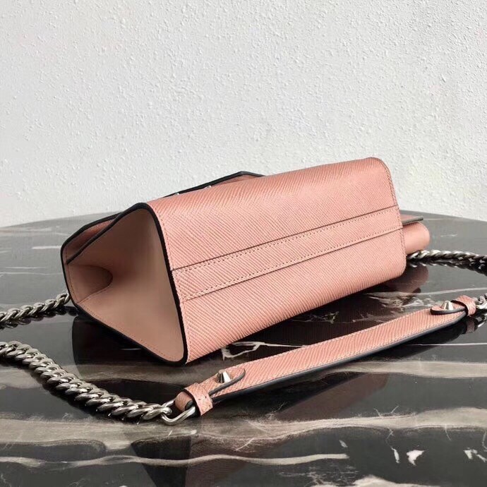 Pra*a nude monochrome flap bag with metal appliques