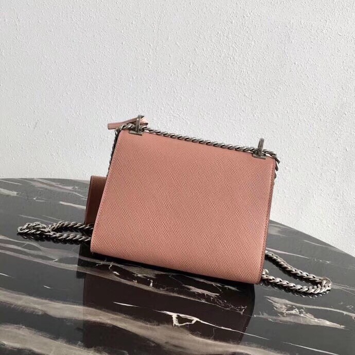 Pra*a nude monochrome flap bag with metal appliques