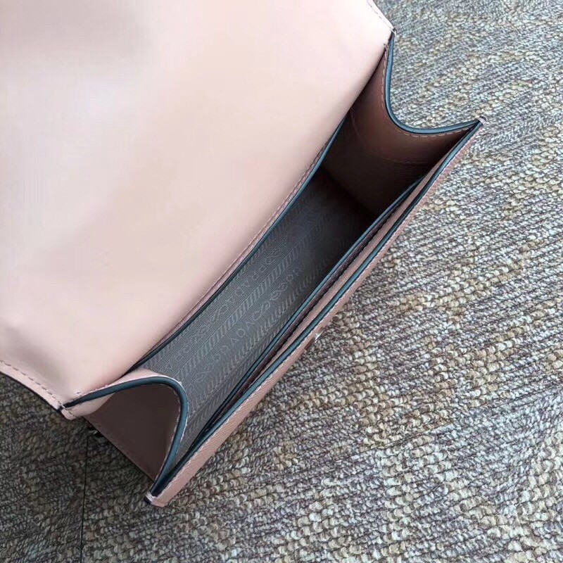 Pra*a monochrome flap bag in powder pink saffiano leather