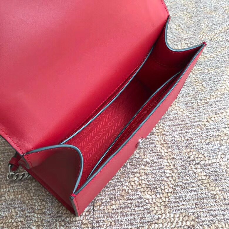 Pra*a monochrome flap bag in red saffiano leather