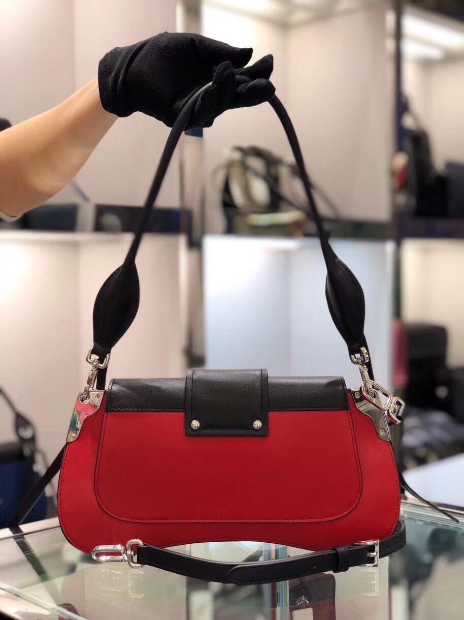 Pra*a sidonie shoulder bag in red/black leather