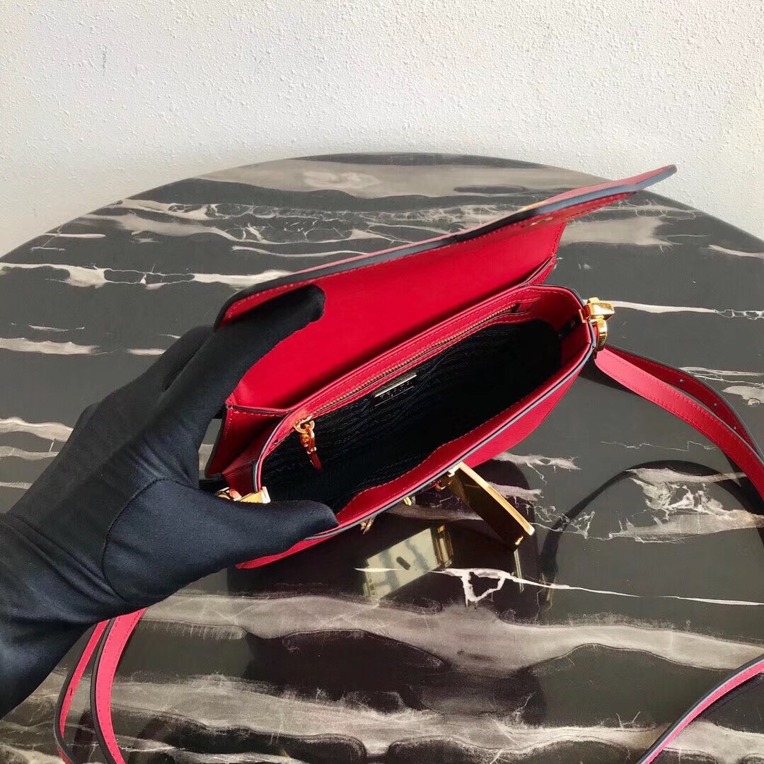 Pra*a embleme bag in red saffiano leather