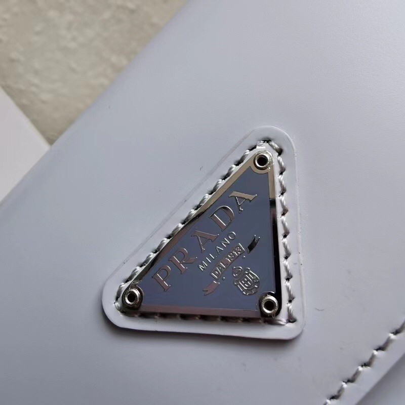 Pra*a cleo flap bag in cornflower blue brushed leather