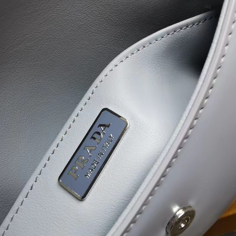 Pra*a cleo flap bag in cornflower blue brushed leather