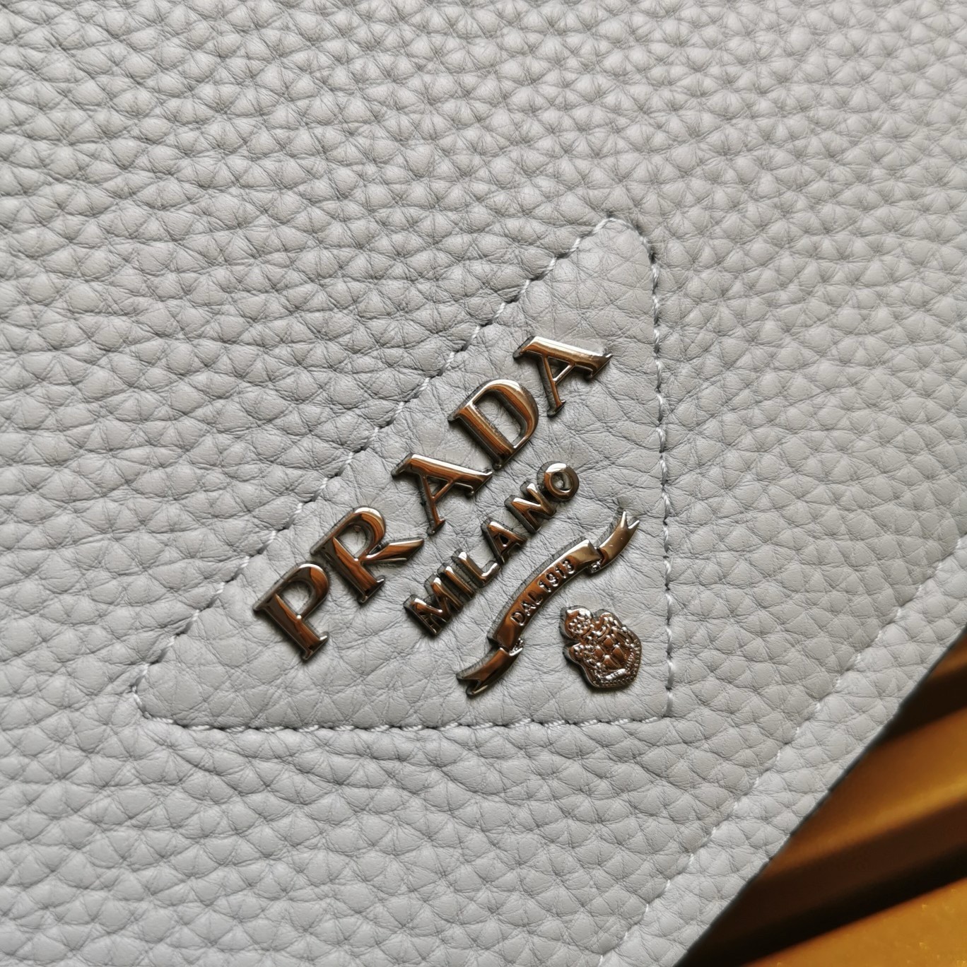 Pra*a flap shoulder bag in cornflower grained leather