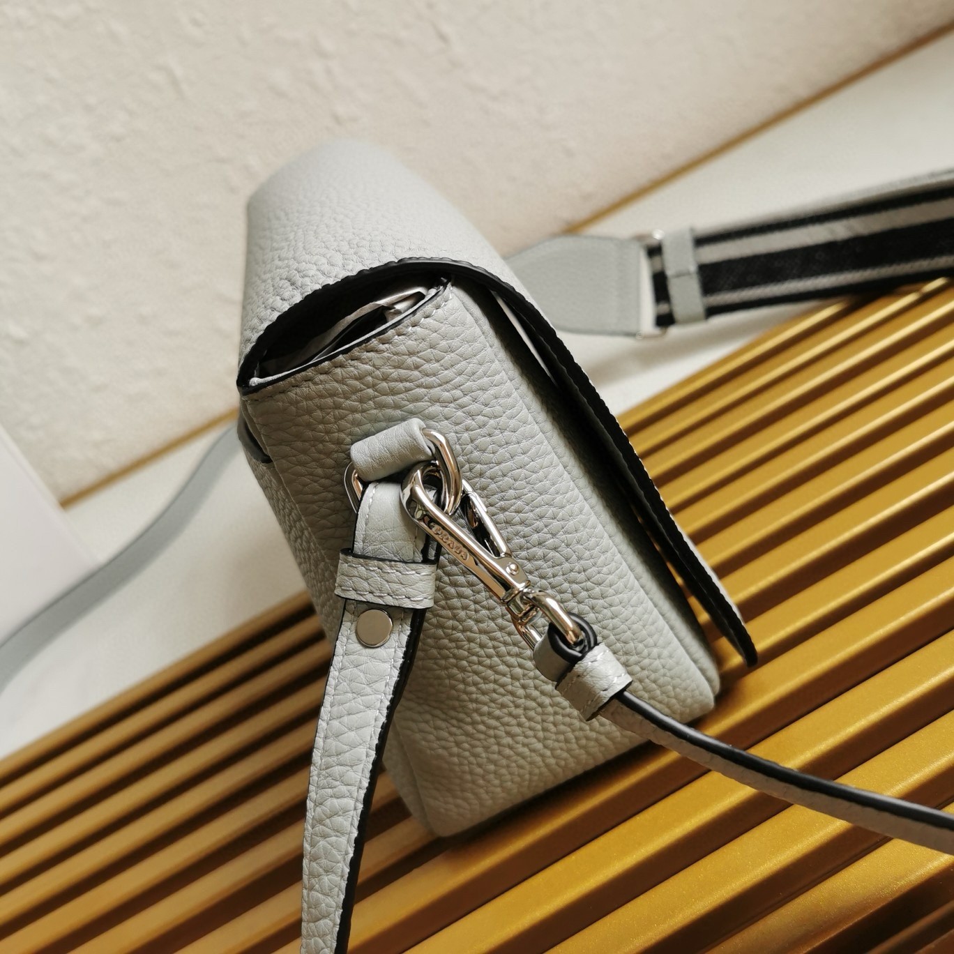 Pra*a flap shoulder bag in cornflower grained leather