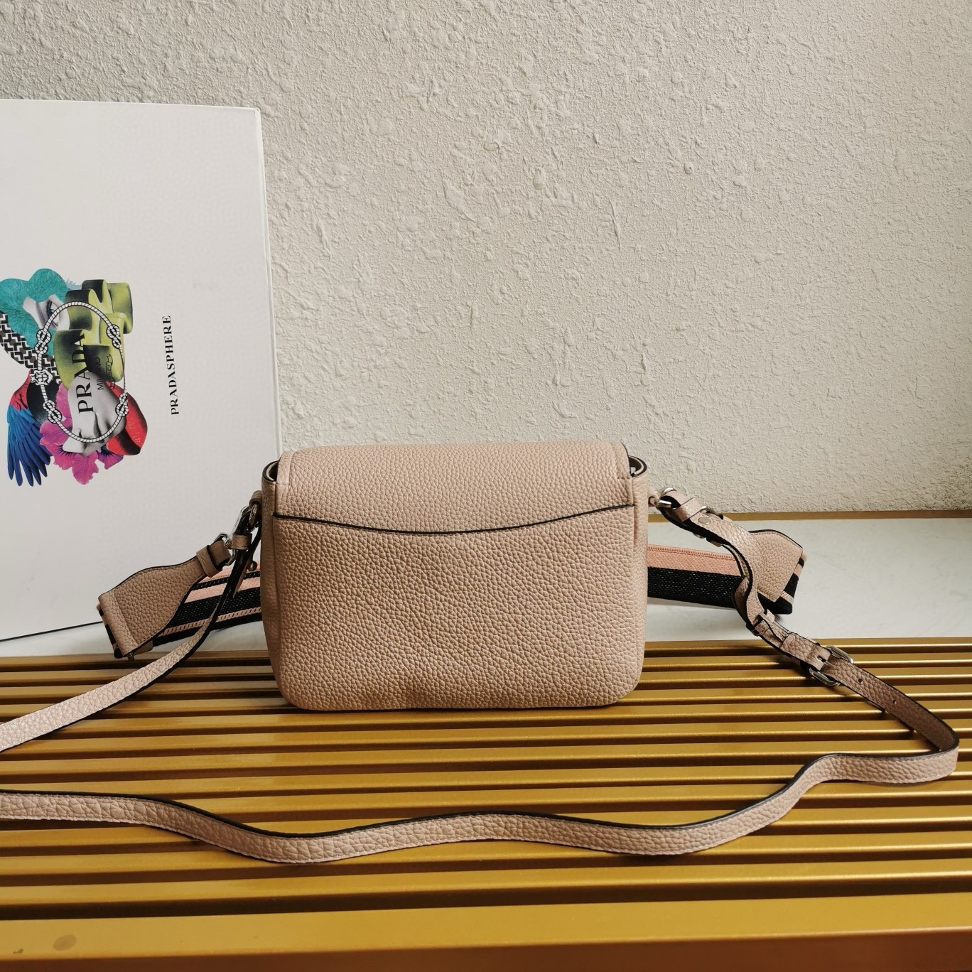Pra*a flap shoulder bag in light pink grained leather