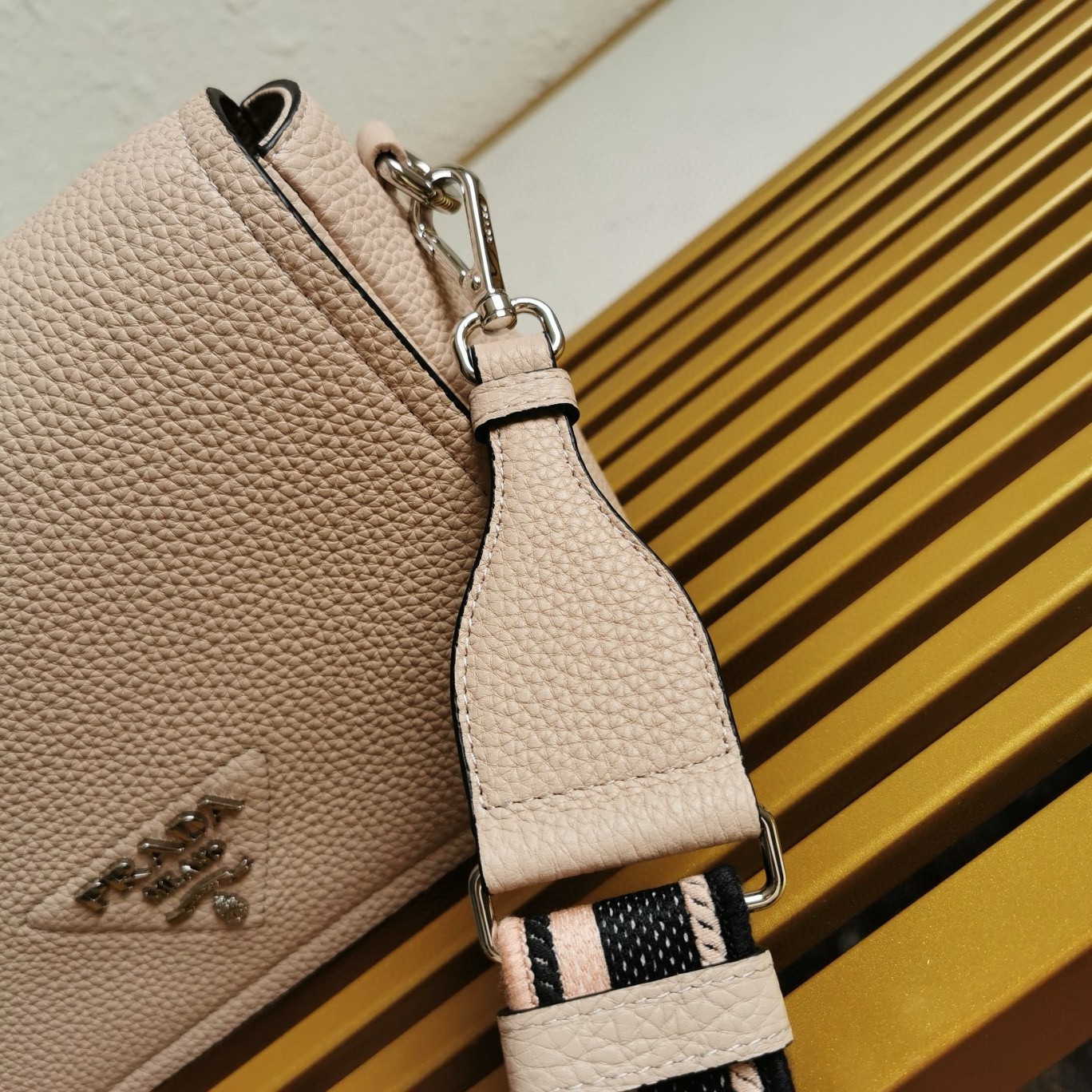 Pra*a flap shoulder bag in light pink grained leather