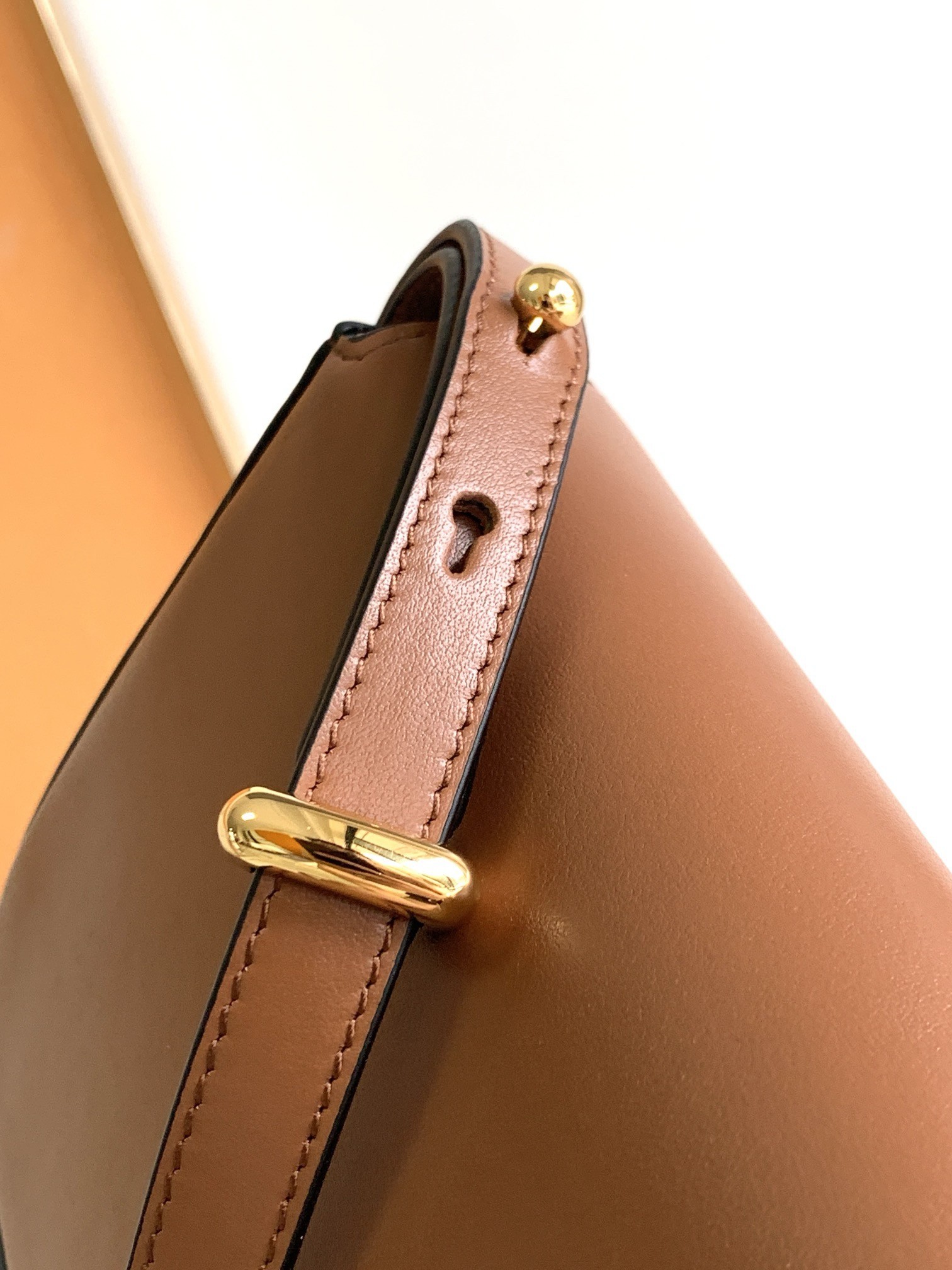 Pra*a shoulder bag in cognac smooth calfskin