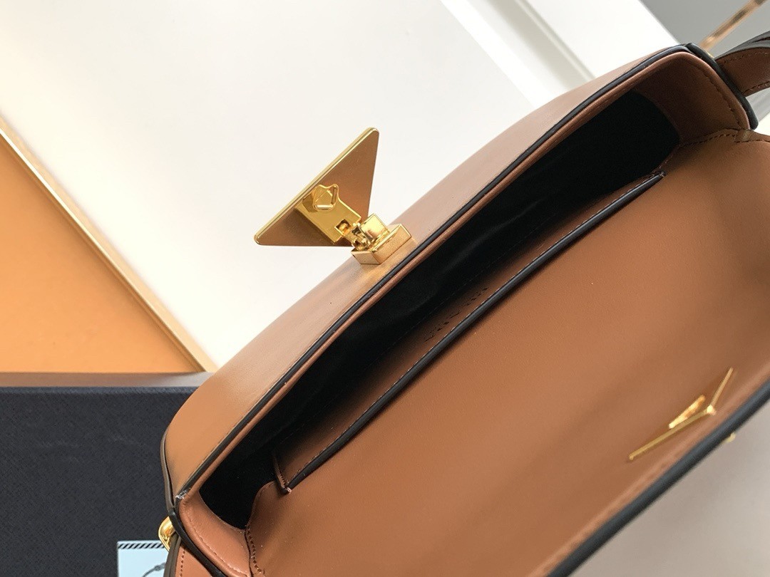Pra*a shoulder bag in cognac smooth calfskin