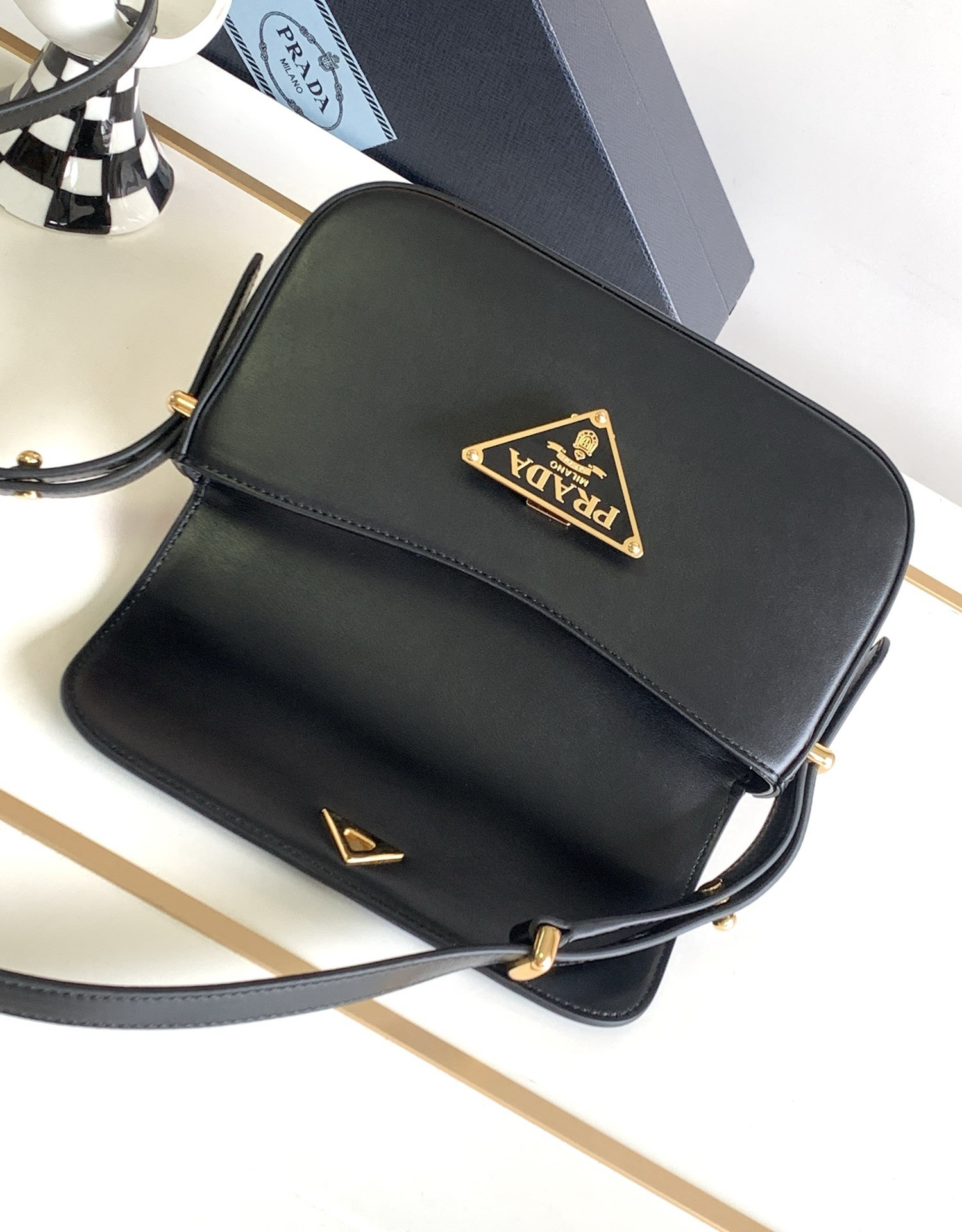 Pra*a shoulder bag in black smooth calfskin