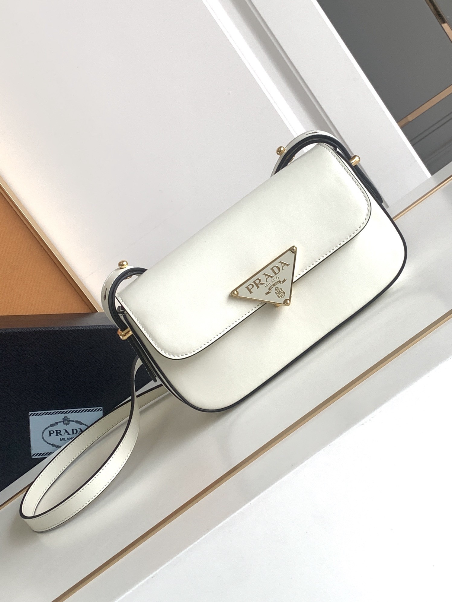 Pra*a shoulder bag in white smooth calfskin