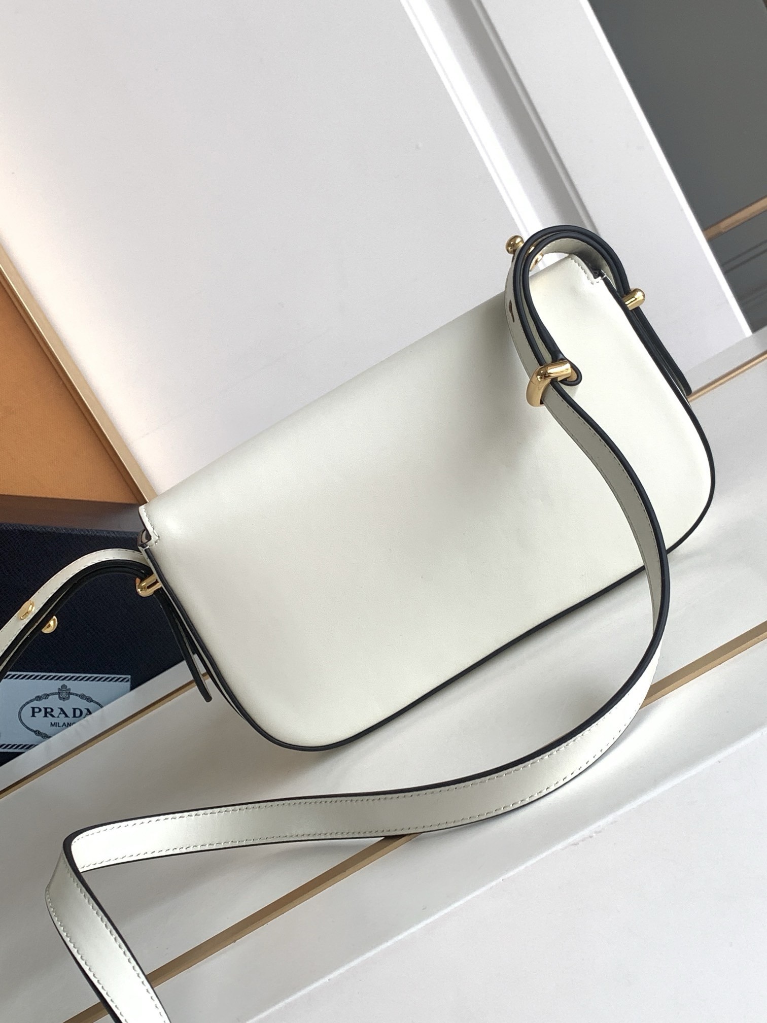 Pra*a shoulder bag in white smooth calfskin