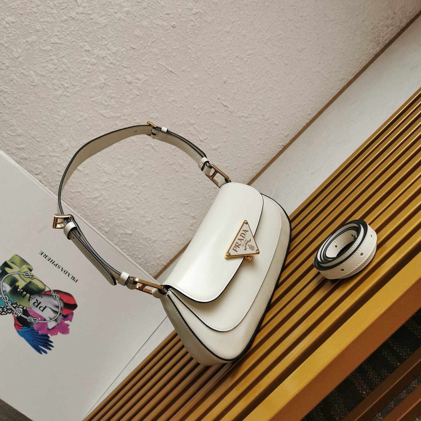 Pra*a shoulder bag in white brushed calfskin