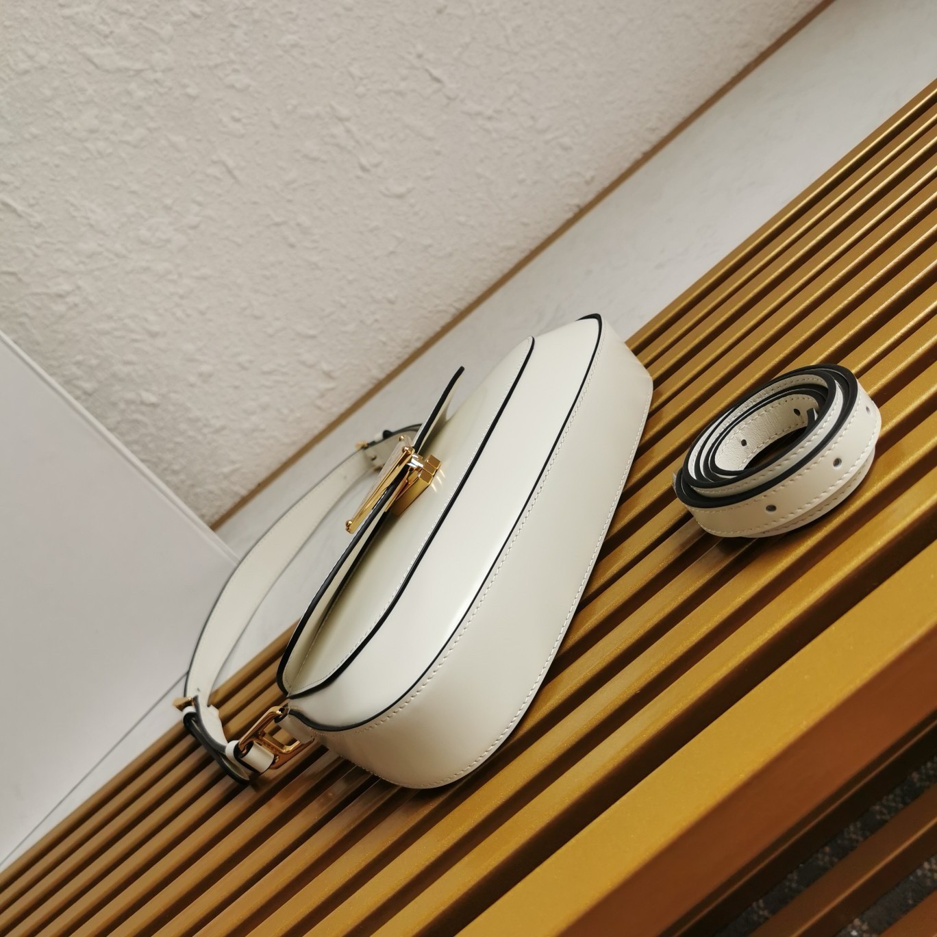 Pra*a shoulder bag in white brushed calfskin