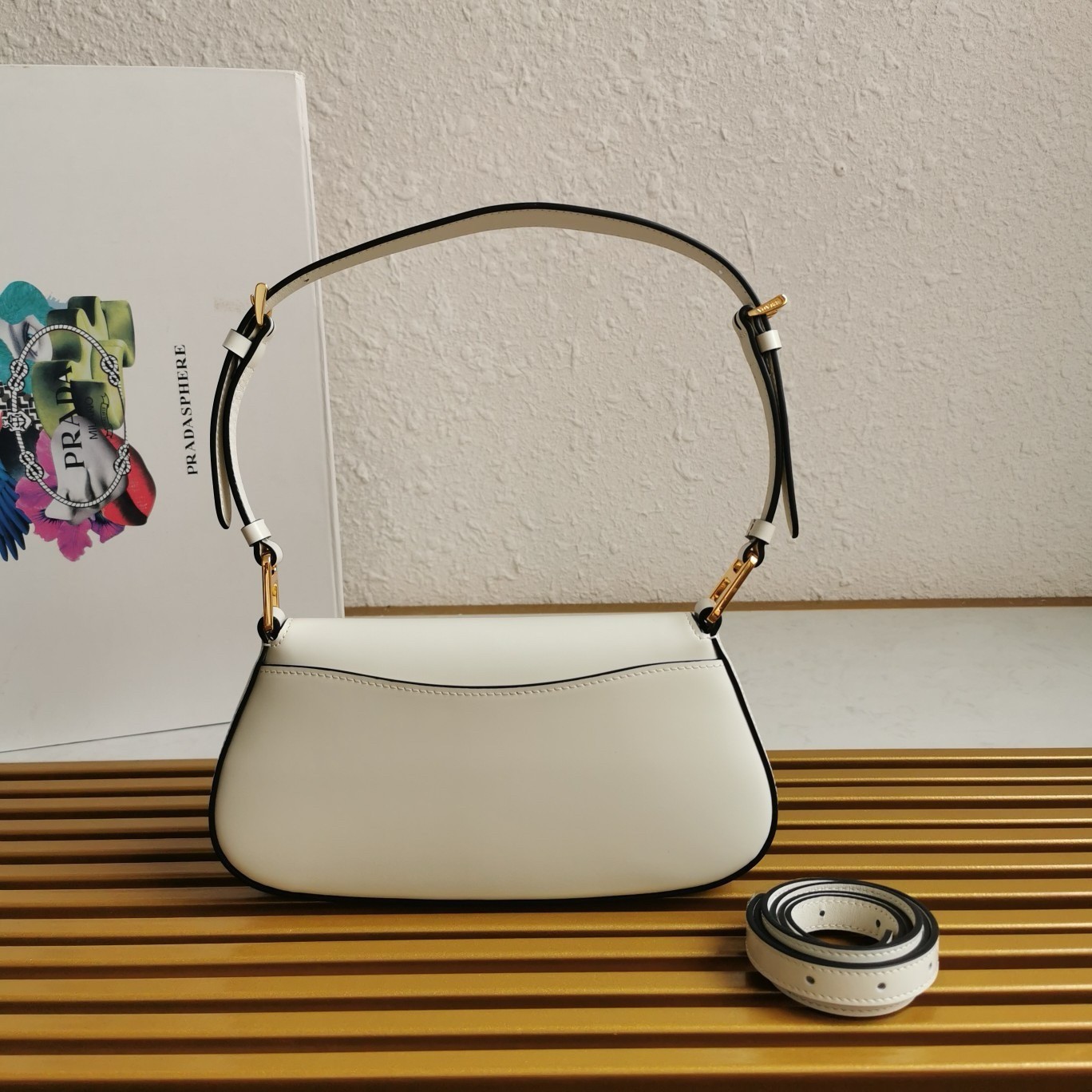 Pra*a shoulder bag in white brushed calfskin