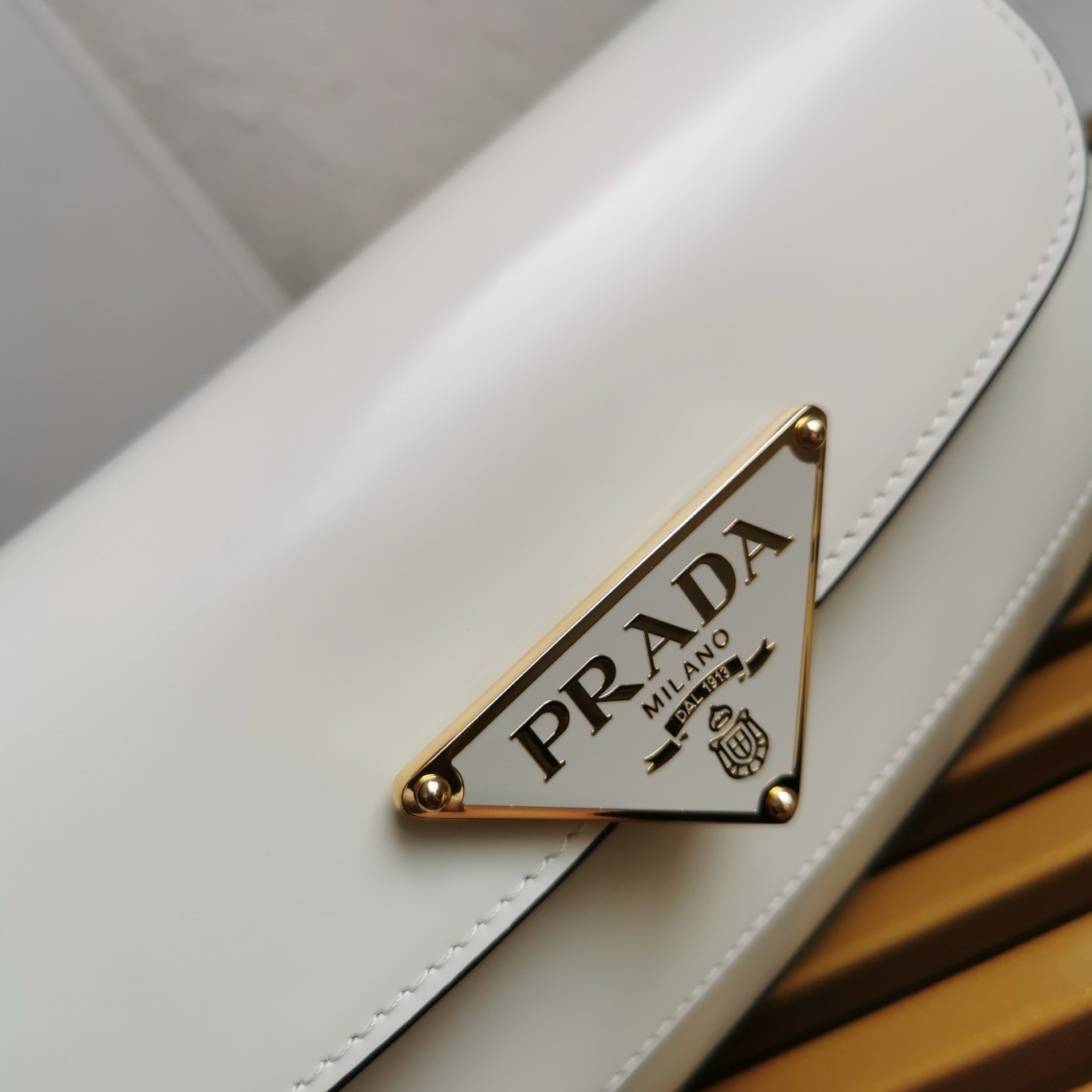 Pra*a shoulder bag in white brushed calfskin