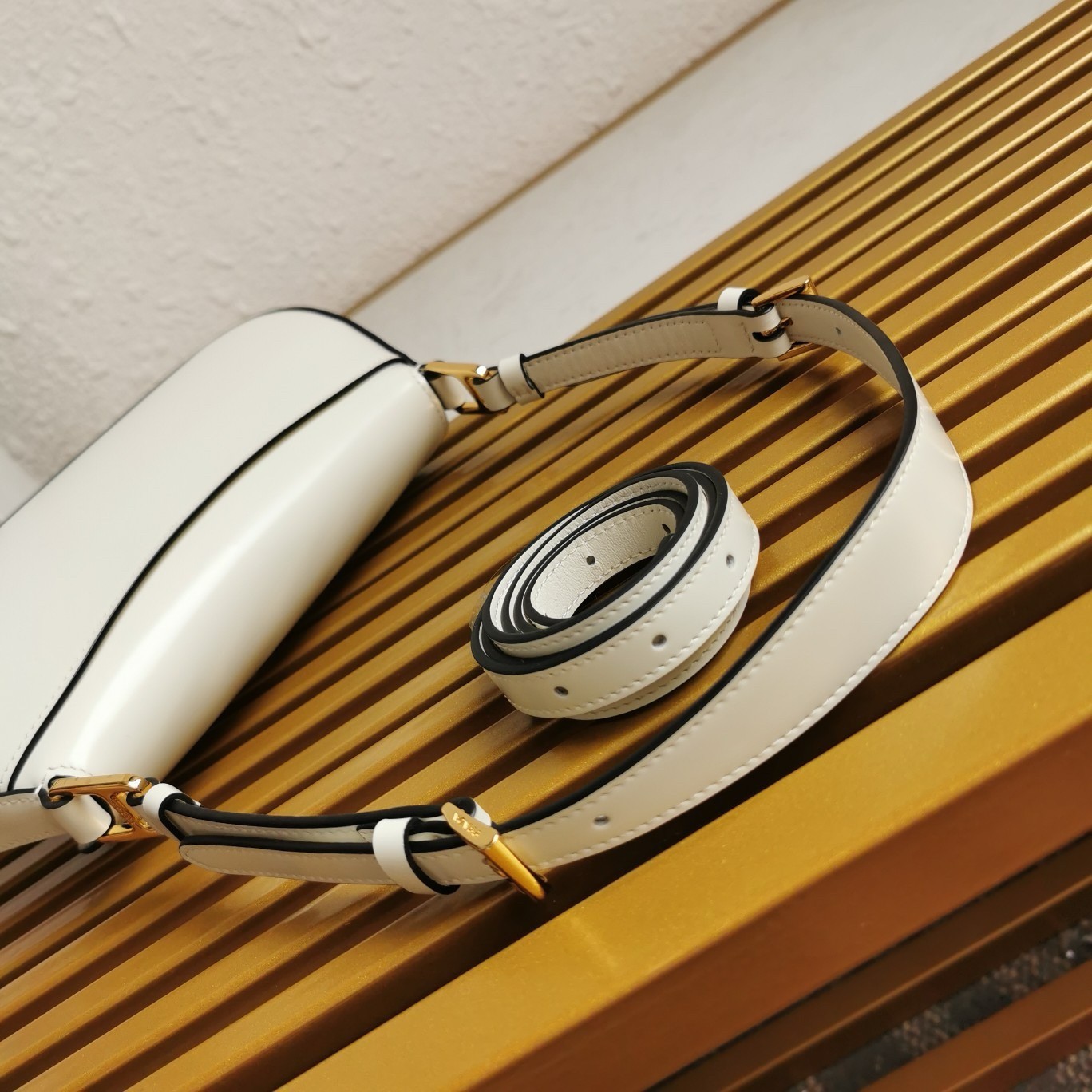 Pra*a shoulder bag in white brushed calfskin