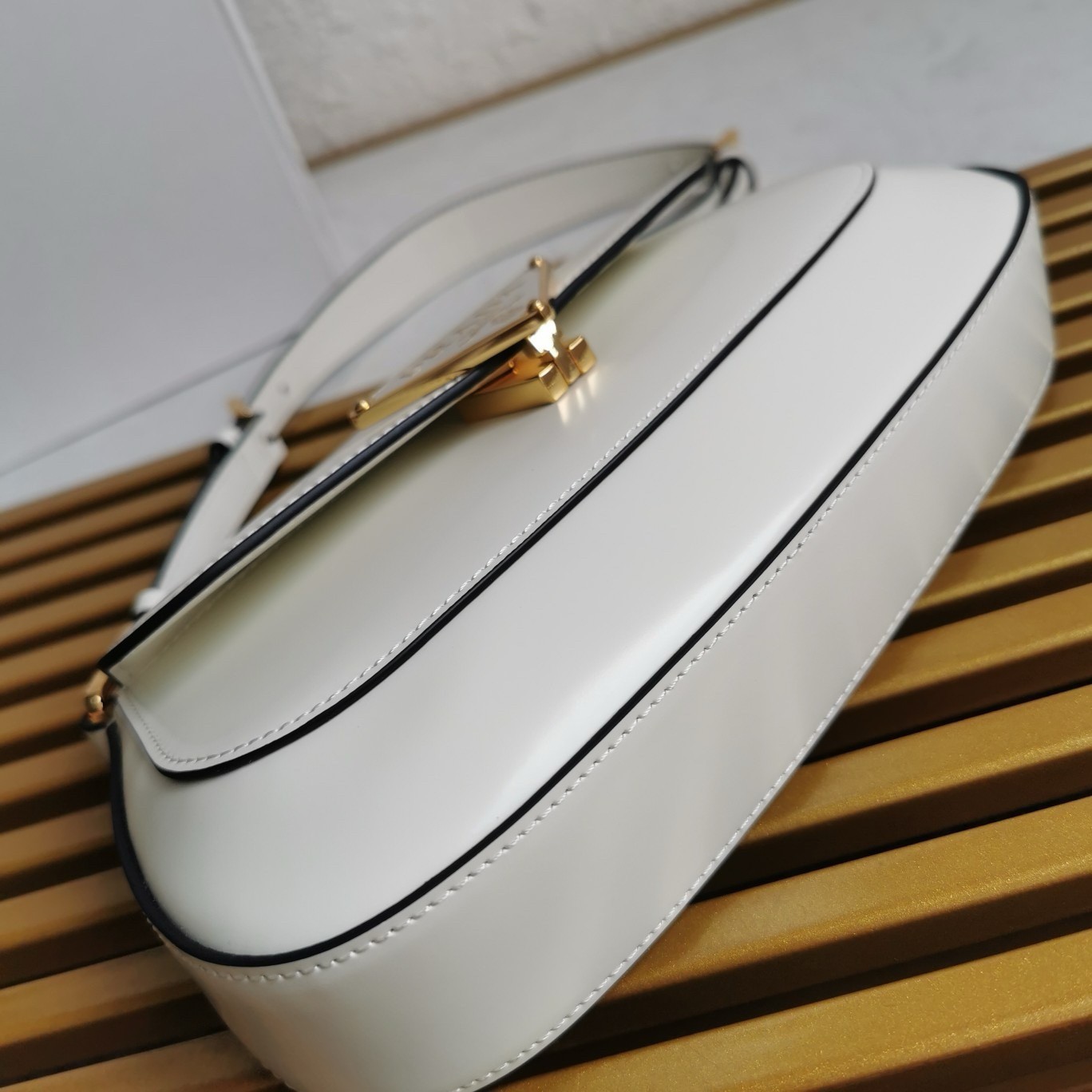 Pra*a shoulder bag in white brushed calfskin