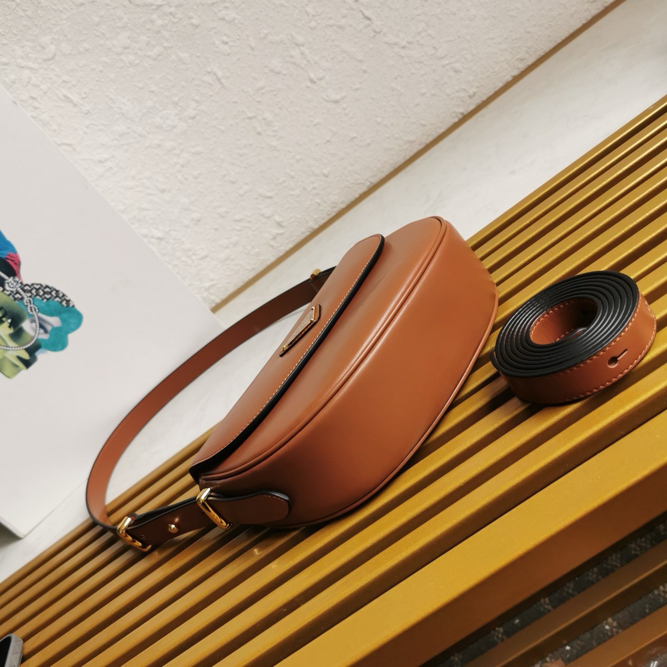 Pra*a arque shoulder bag with flap in brown leather