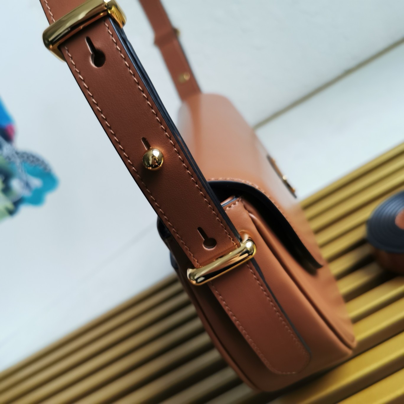 Pra*a arque shoulder bag with flap in brown leather