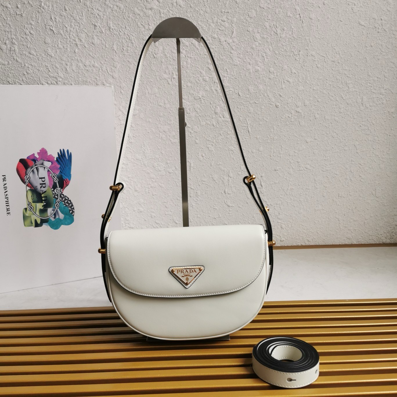 Pra*a arque shoulder bag with flap in white leather
