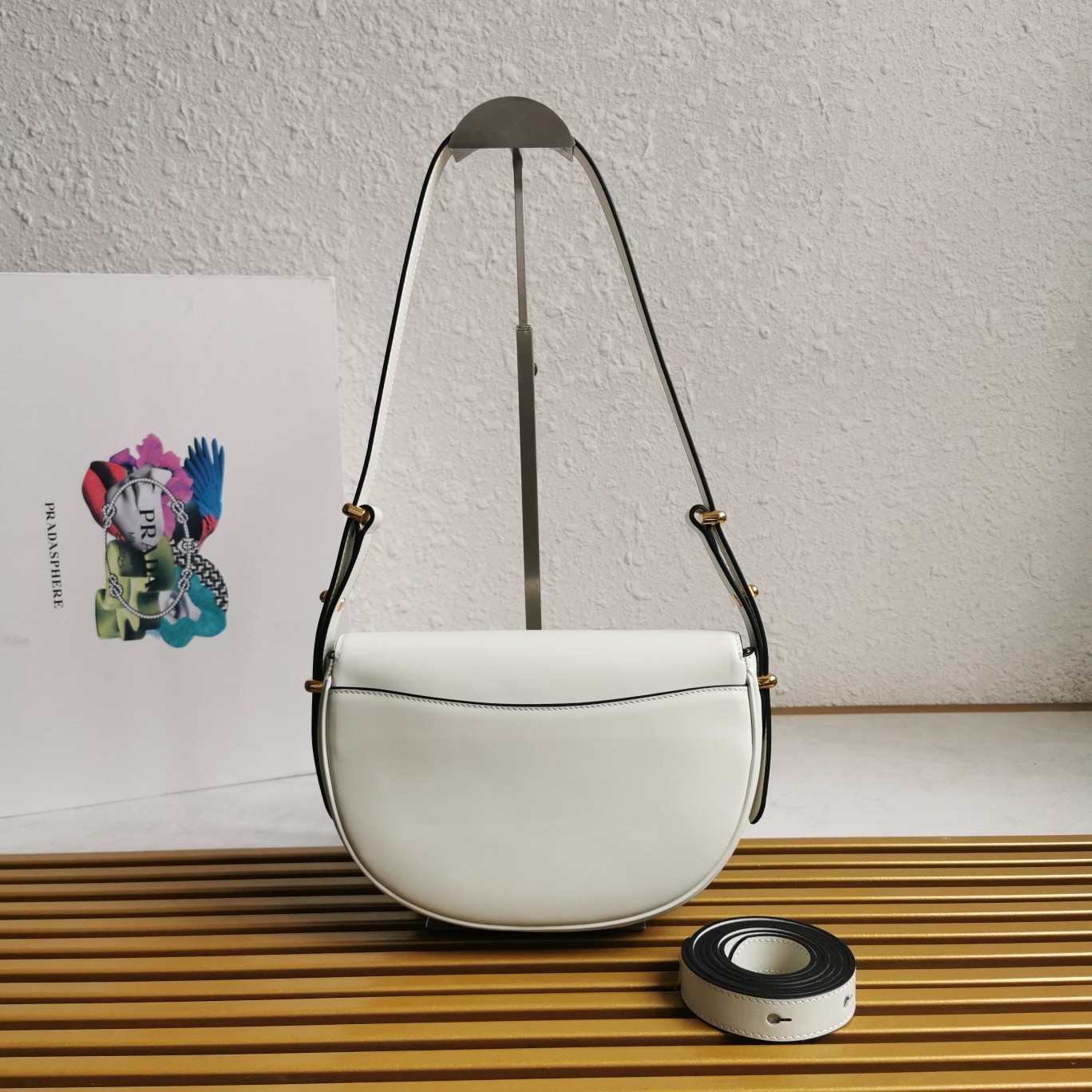 Pra*a arque shoulder bag with flap in white leather