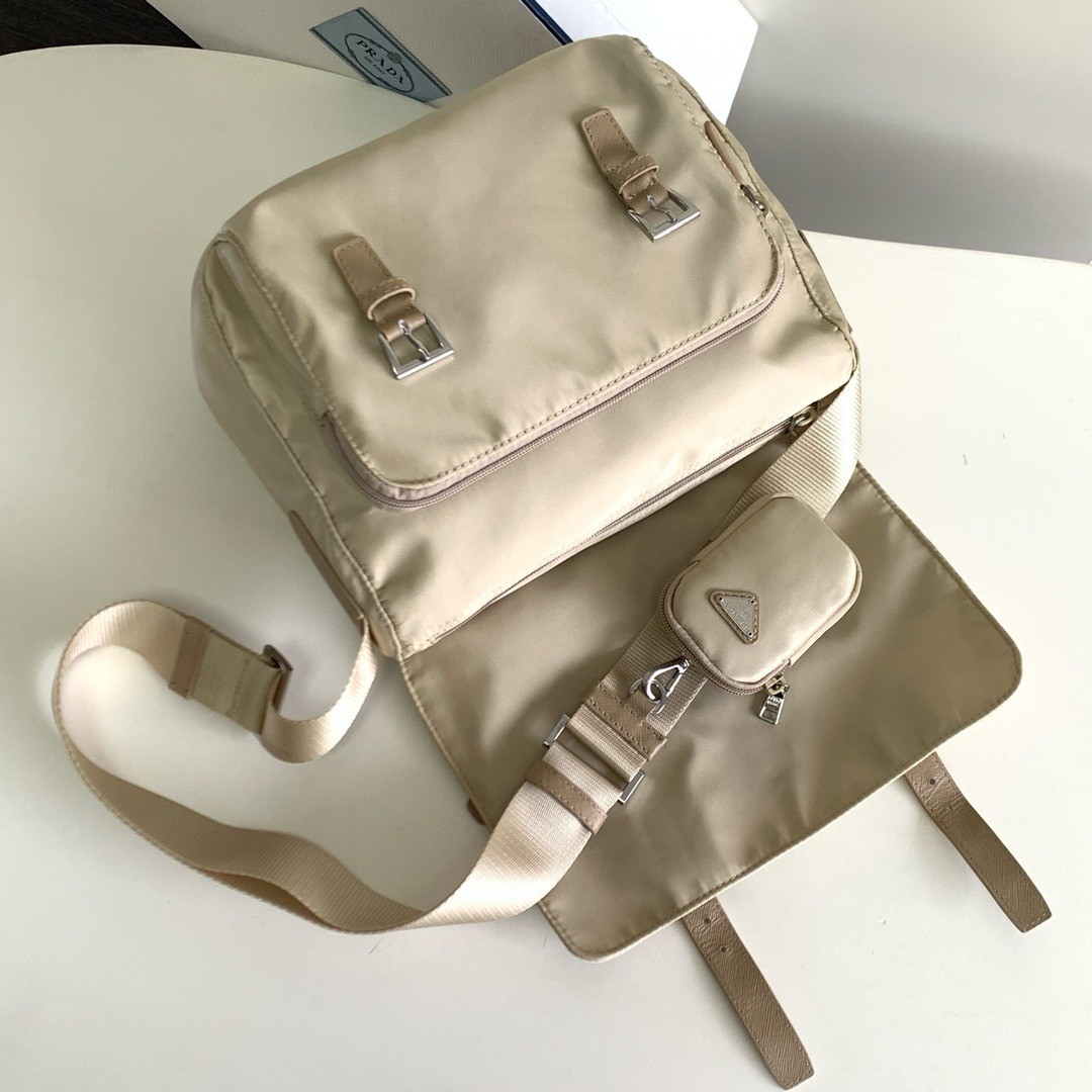 Pra*a shoulder bag with flap in beige re-nylon