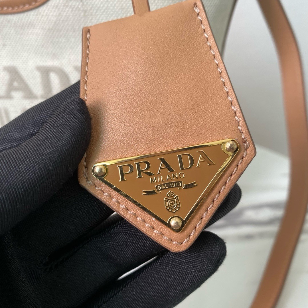 Pra*a mini buckle bag in linen blend and leather